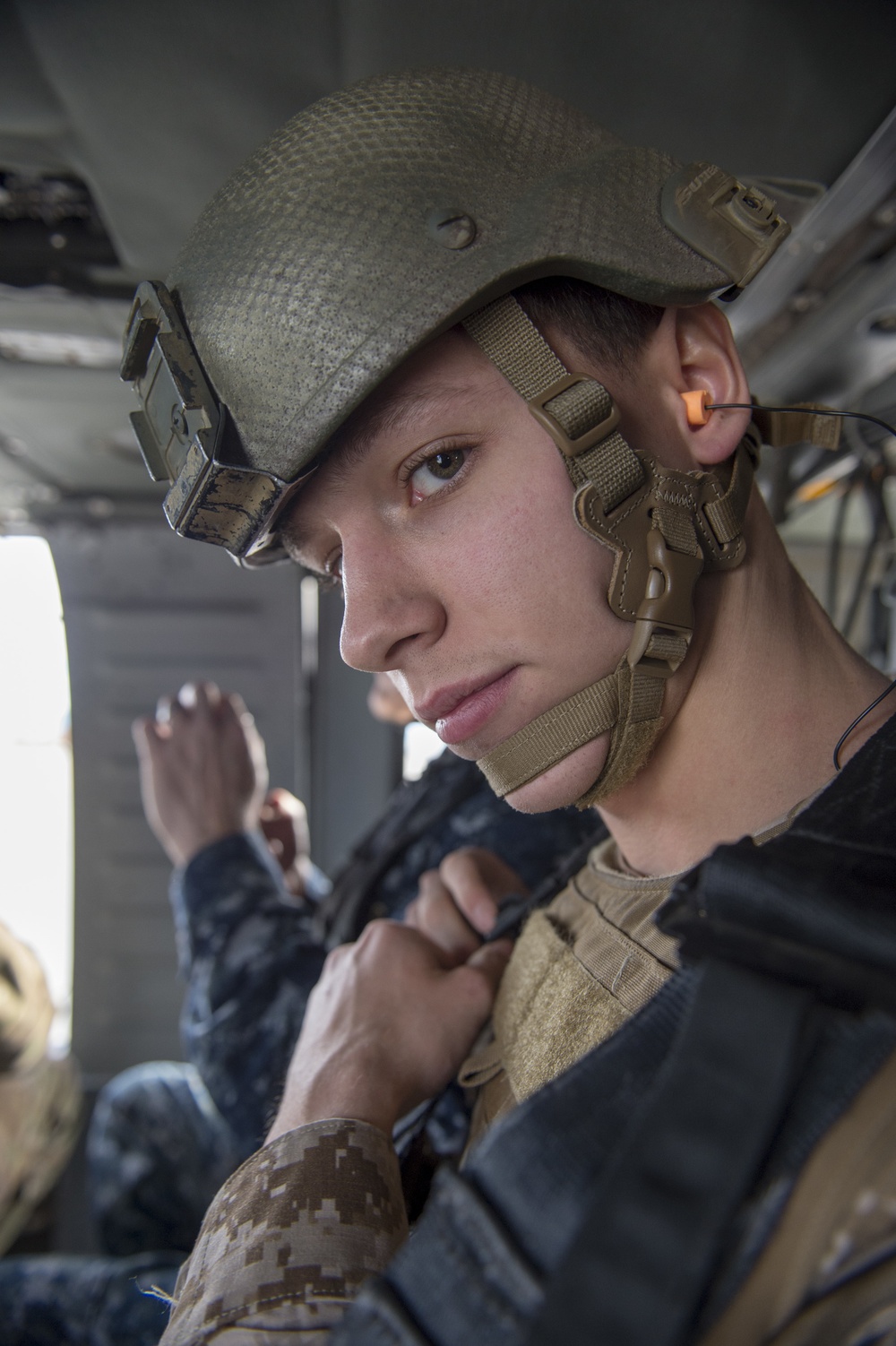 U.S. Naval Sea Cadets fly on a Black Hawk