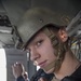 U.S. Naval Sea Cadets fly on a Black Hawk