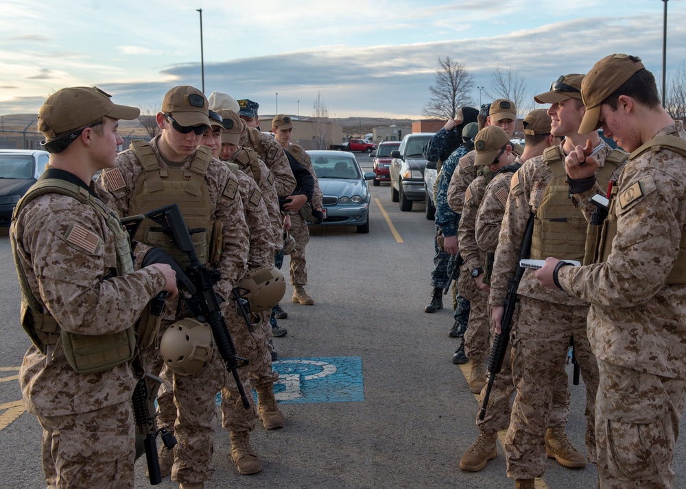 U.S. Naval Sea Cadets fly on a Black Hawk