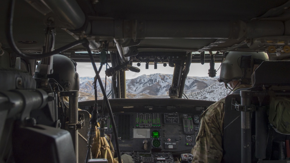 U.S. Naval Sea Cadets fly on a Black Hawk