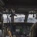 U.S. Naval Sea Cadets fly on a Black Hawk