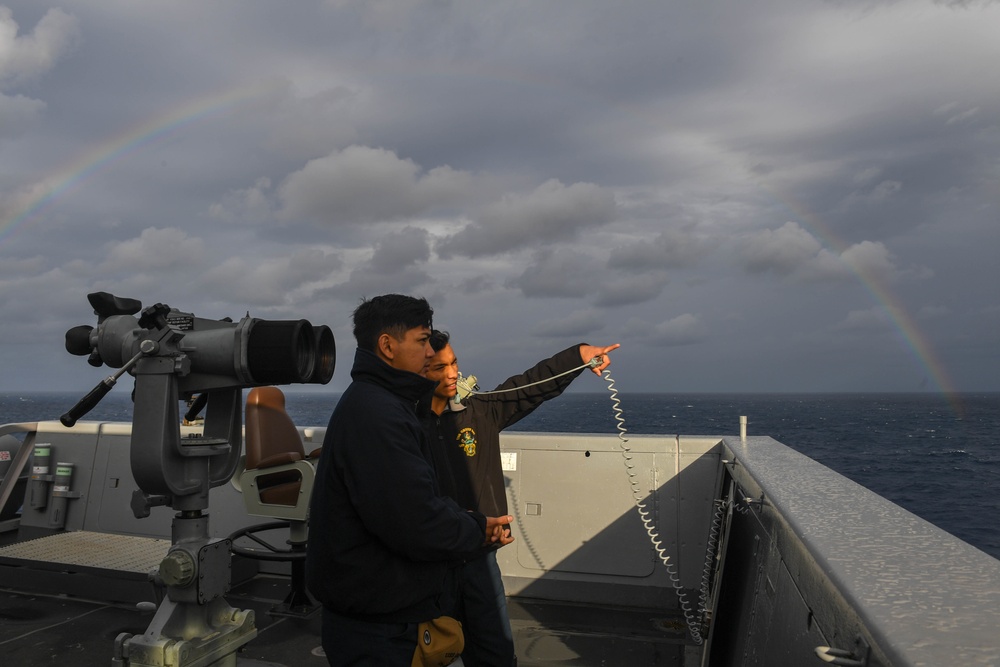 USS Green Bay (LPD 20) sails with U.S Ships