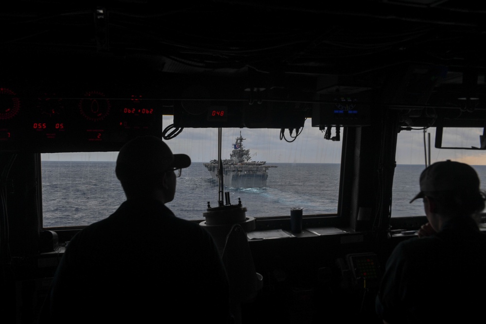 USS Green Bay (LPD 20) sails with U.S Ships