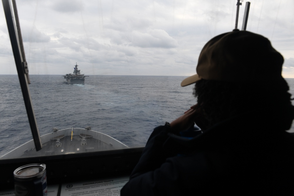 USS Green Bay (LPD 20) sails with U.S Ships