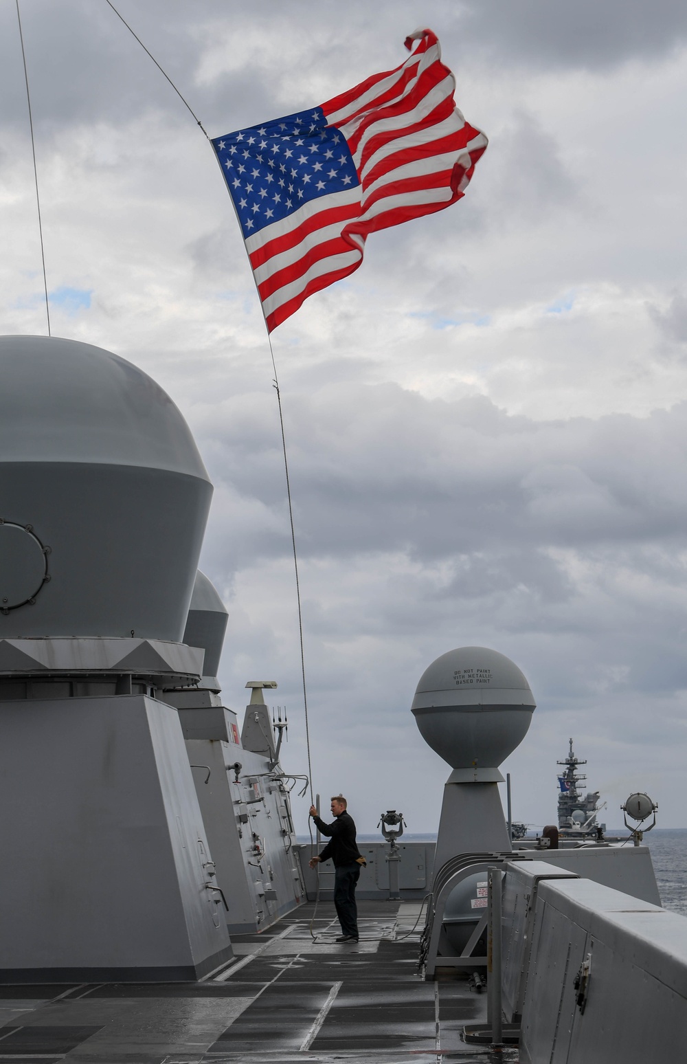 USS Green Bay (LPD 20) sails with U.S Ships