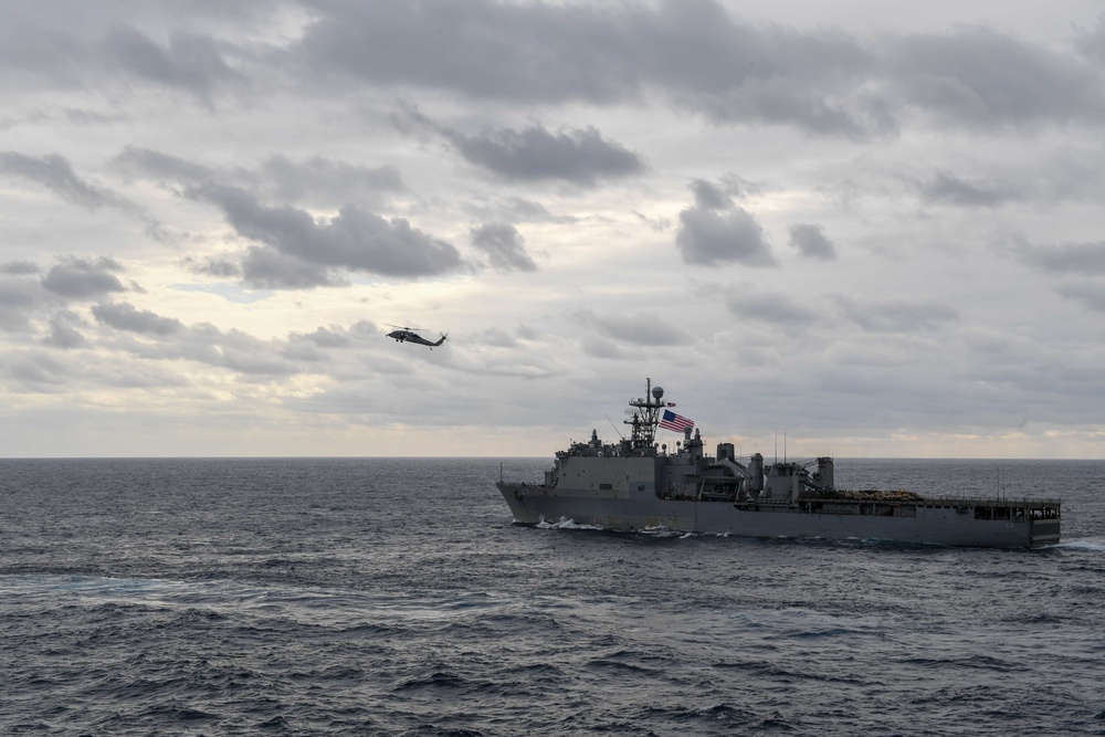 USS Green Bay (LPD 20) sails with U.S Ships