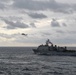 USS Green Bay (LPD 20) sails with U.S Ships