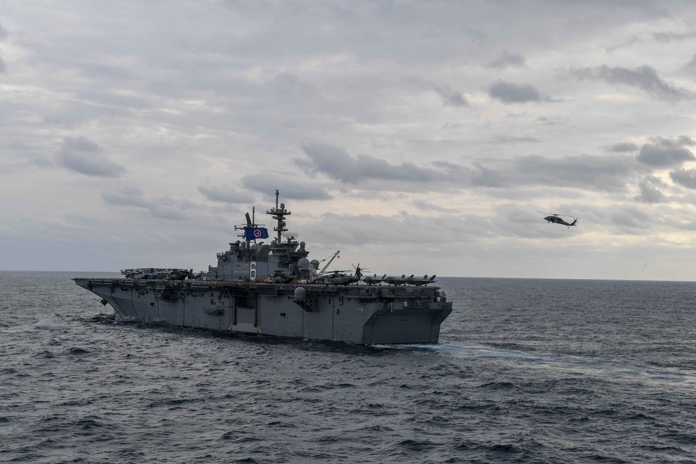 USS Green Bay (LPD 20) sails with U.S Ships