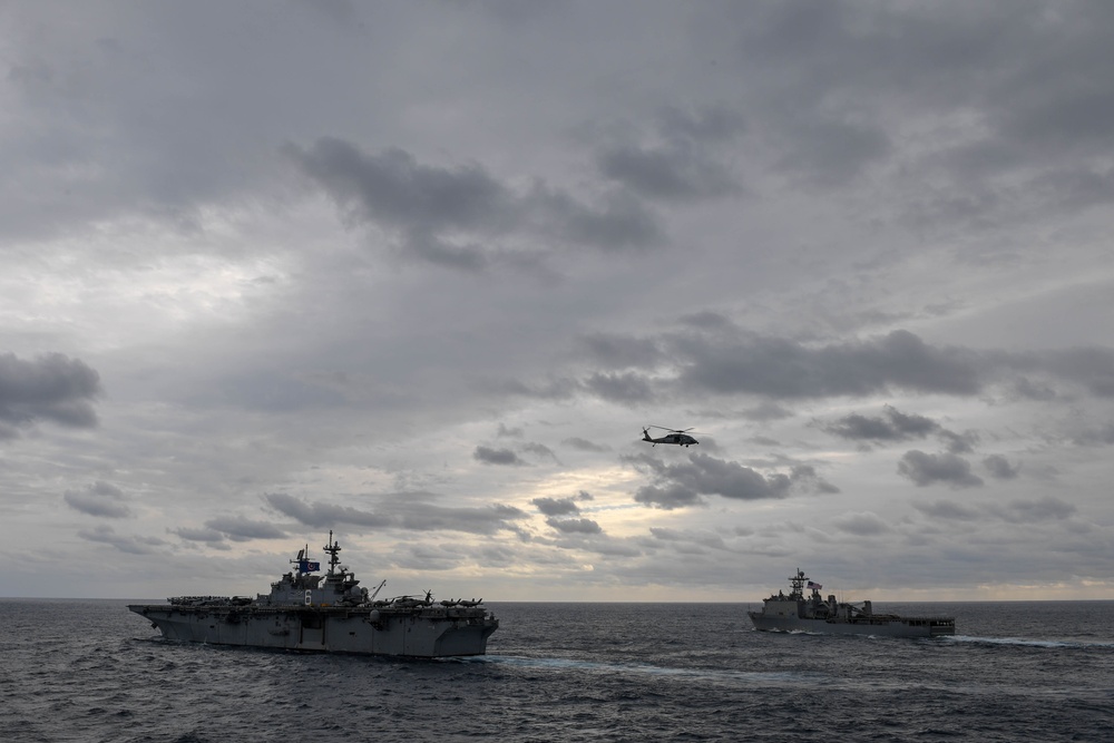 USS Green Bay (LPD 20) sails with U.S Ships