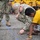 U.S. Navy Seabees with NMCB-5's Detail Pohnpei participate in the Sokehs Elementary School opening ceremony activities