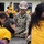 U.S. Navy Seabees with NMCB-5's Detail Pohnpei participate in the Sokehs Elementary School opening ceremony activities