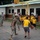 U.S. Navy Seabees with NMCB-5's Detail Pohnpei participate in the Sokehs Elementary School opening ceremony activities