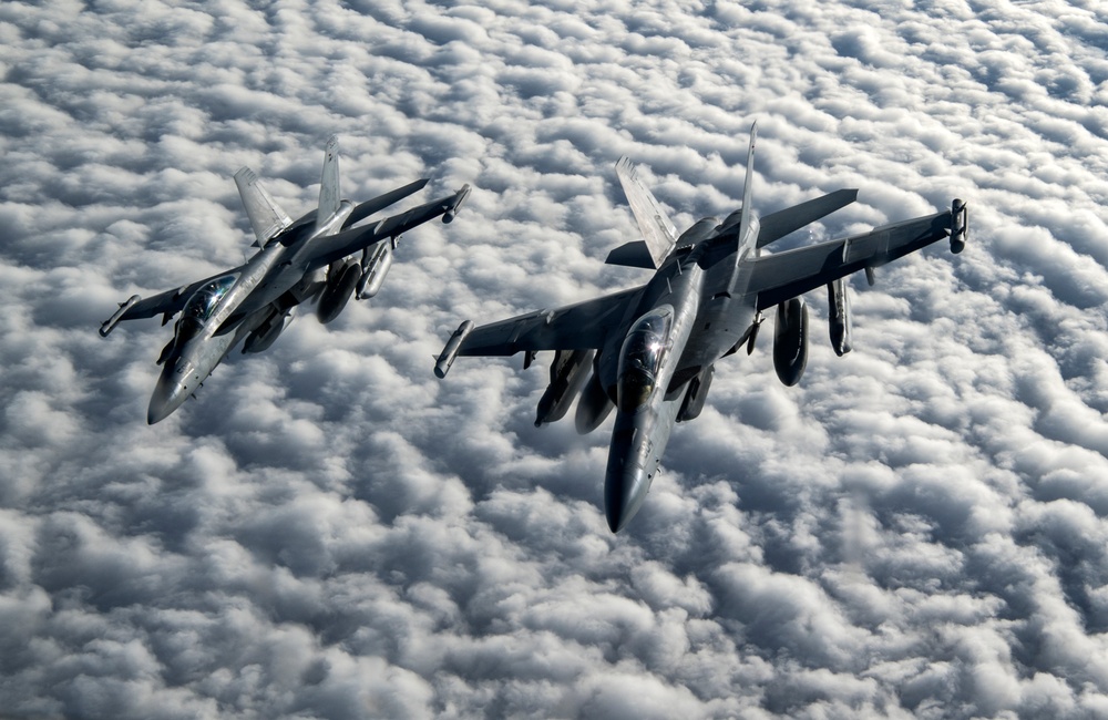 The Air Force refueling the Navy