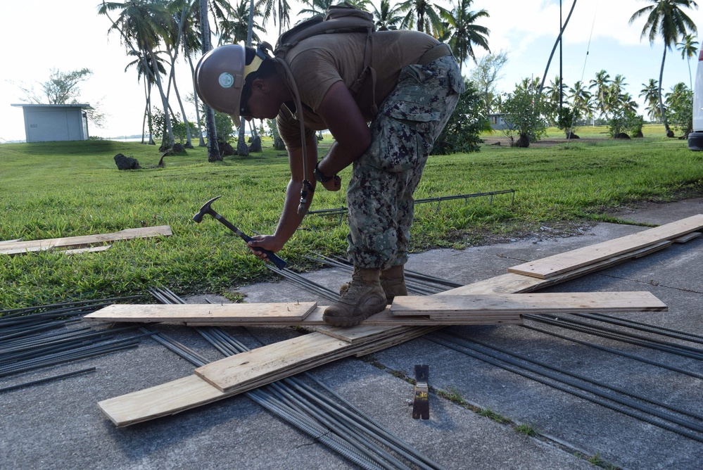 U.S. Navy Seabees from NMCB 5’s Detail Diego Garcia conduct high quality construction