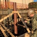 U.S. Navy Seabees deployed with NMCB-5's Detail Atsugi construct a loading dock at the Navy Exchange, Naval Air Facility Atsugi