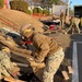 U.S. Navy Seabees deployed with NMCB-5's Detail Atsugi construct a loading dock