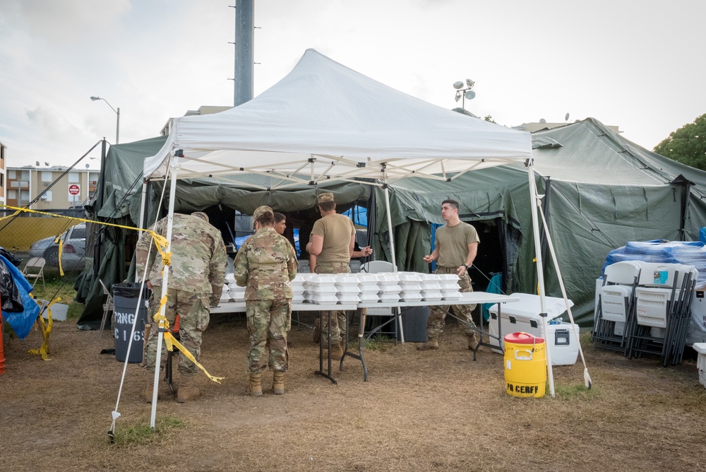 National Guard Base Camp Feeds Staff After Quake