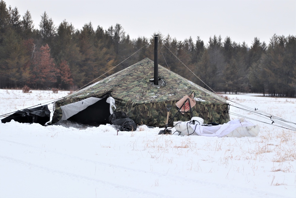 Cold-Weather Operations Course students practice use of Arctic 10-person tent at Fort McCoy