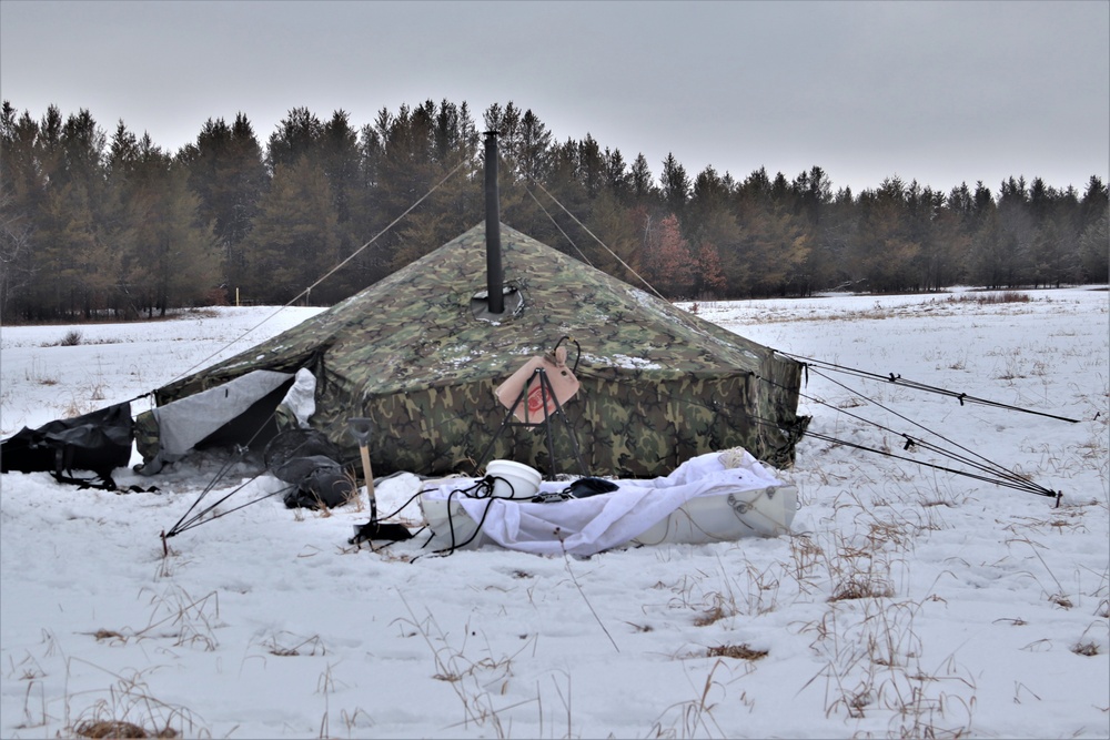 Cold-Weather Operations Course students practice use of Arctic 10-person tent at Fort McCoy