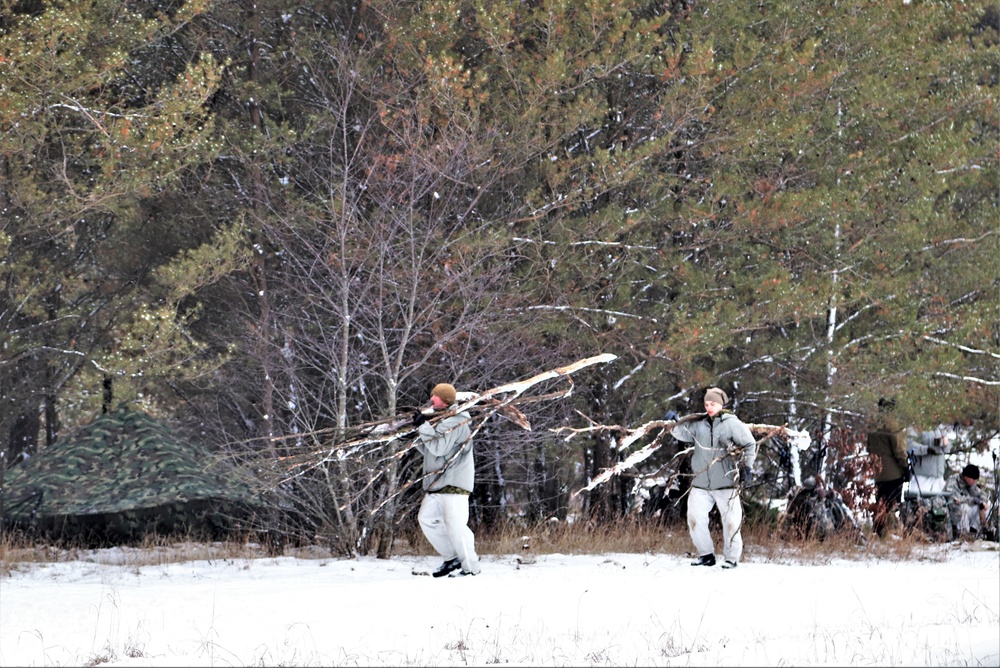 Cold-Weather Operations Course students practice use of Arctic 10-person tent at Fort McCoy