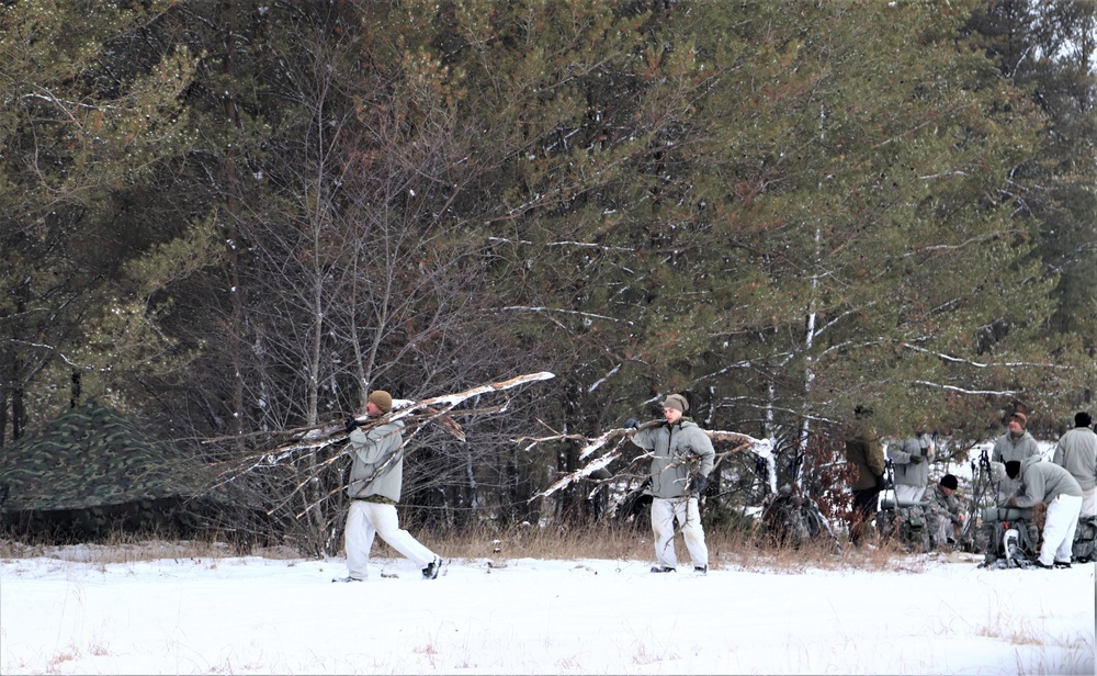 Cold-Weather Operations Course students practice use of Arctic 10-person tent at Fort McCoy