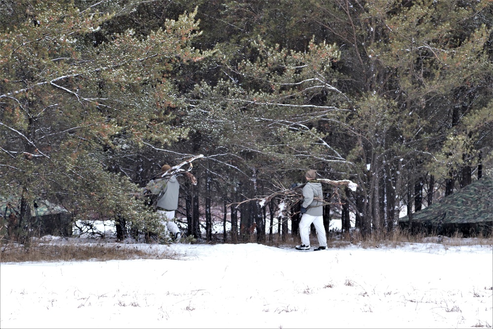 Cold-Weather Operations Course students practice use of Arctic 10-person tent at Fort McCoy