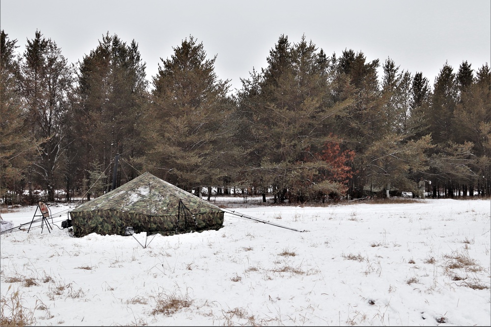 Cold-Weather Operations Course students practice use of Arctic 10-person tent at Fort McCoy