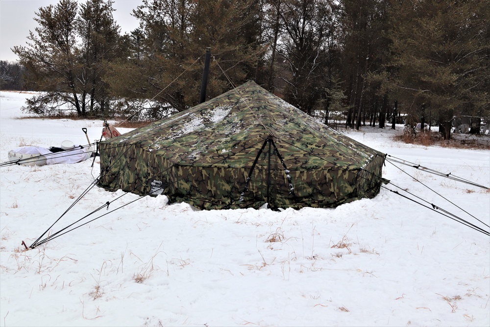 Cold-Weather Operations Course students practice use of Arctic 10-person tent at Fort McCoy
