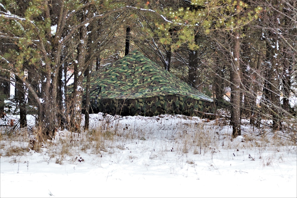 Cold-Weather Operations Course students practice use of Arctic 10-person tent at Fort McCoy