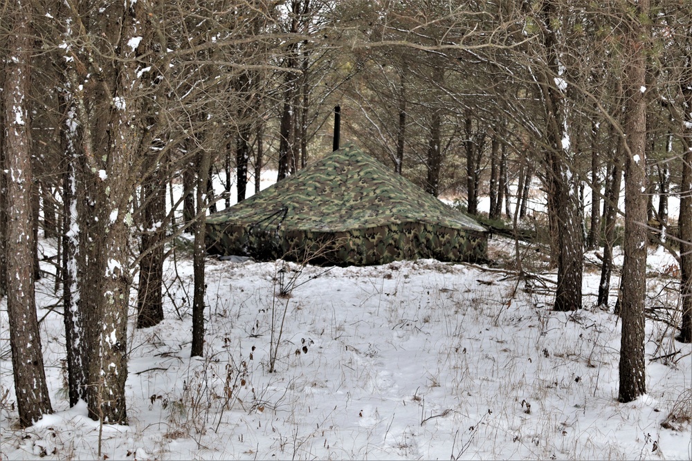 Cold-Weather Operations Course students practice use of Arctic 10-person tent at Fort McCoy