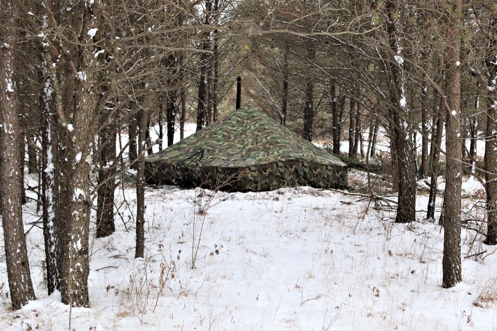 Cold-Weather Operations Course students practice use of Arctic 10-person tent at Fort McCoy