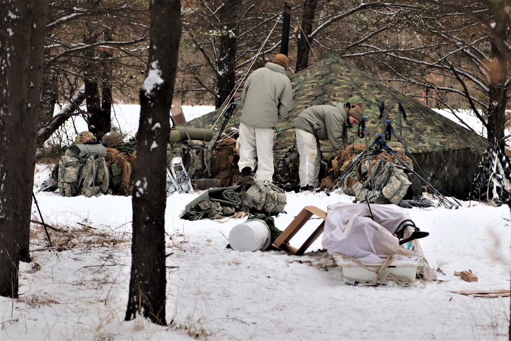 Cold-Weather Operations Course students practice use of Arctic 10-person tent at Fort McCoy