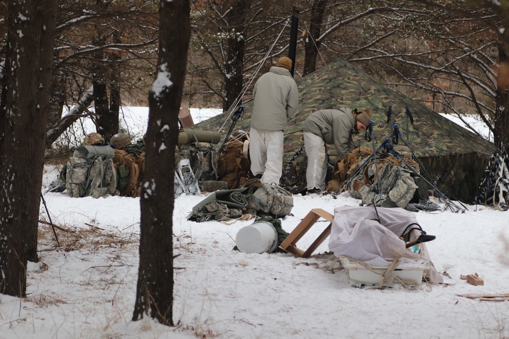 Cold-Weather Operations Course students practice use of Arctic 10-person tent at Fort McCoy