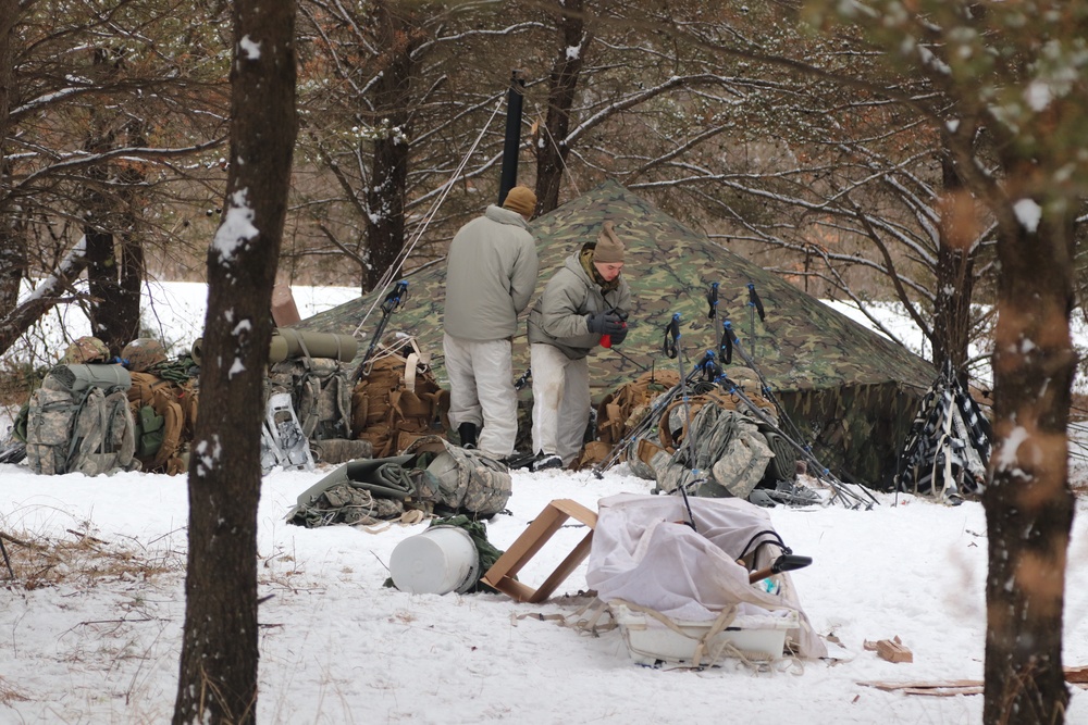 Cold-Weather Operations Course students practice use of Arctic 10-person tent at Fort McCoy