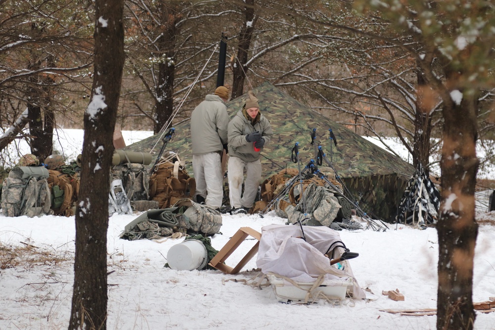 Cold-Weather Operations Course students practice use of Arctic 10-person tent at Fort McCoy