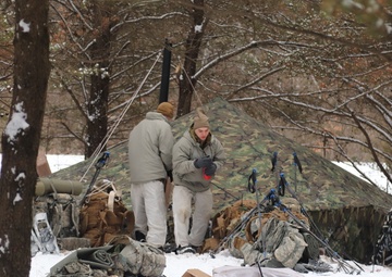 Photo Essay: Cold-Weather Operations Course students practice use of Arctic 10-person tent at Fort McCoy