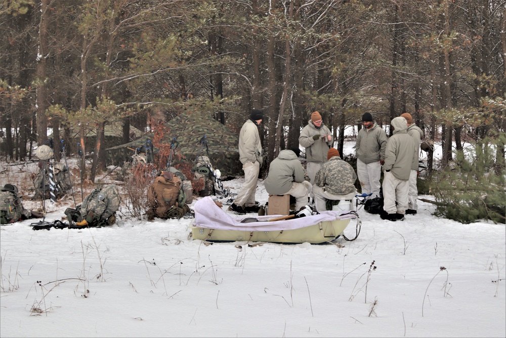 Cold-Weather Operations Course students practice use of Arctic 10-person tent at Fort McCoy