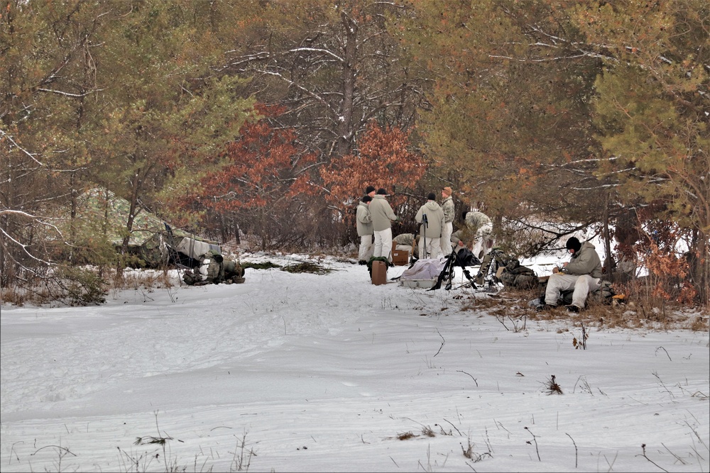 Cold-Weather Operations Course students practice use of Arctic 10-person tent at Fort McCoy