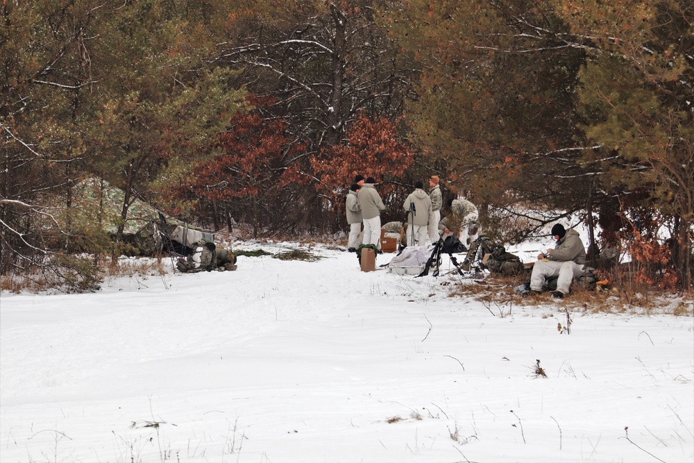 Cold-Weather Operations Course students practice use of Arctic 10-person tent at Fort McCoy