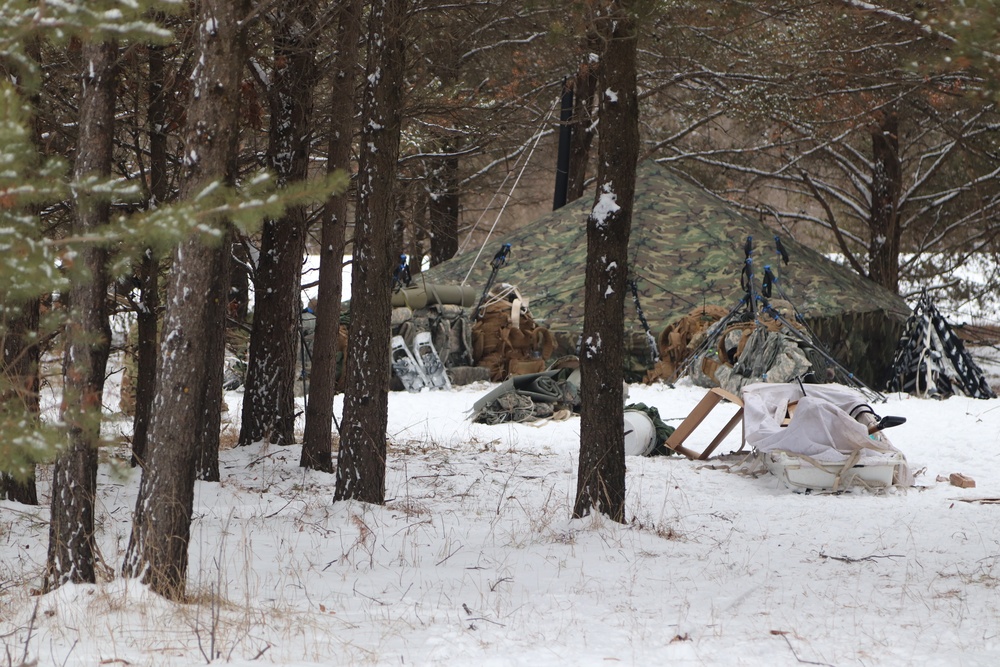 Cold-Weather Operations Course students practice use of Arctic 10-person tent at Fort McCoy
