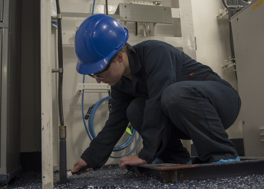 GHWB Sailor Cleans Floor