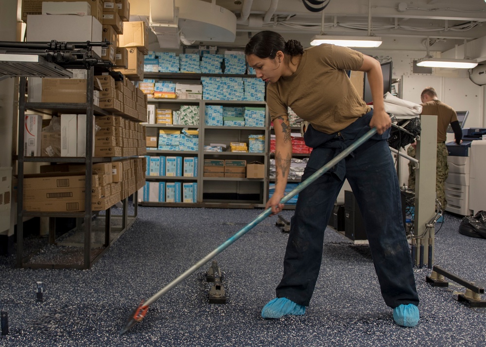 GHWB Sailor Cleans Floor