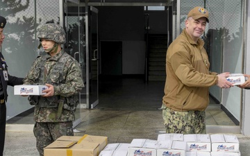 CNFK Sailors and ROK MCPON Deliver Care Packages to Korean Sailors