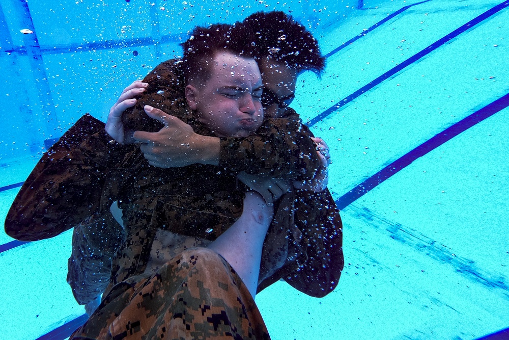 Marines, sailors endure water survival advanced training