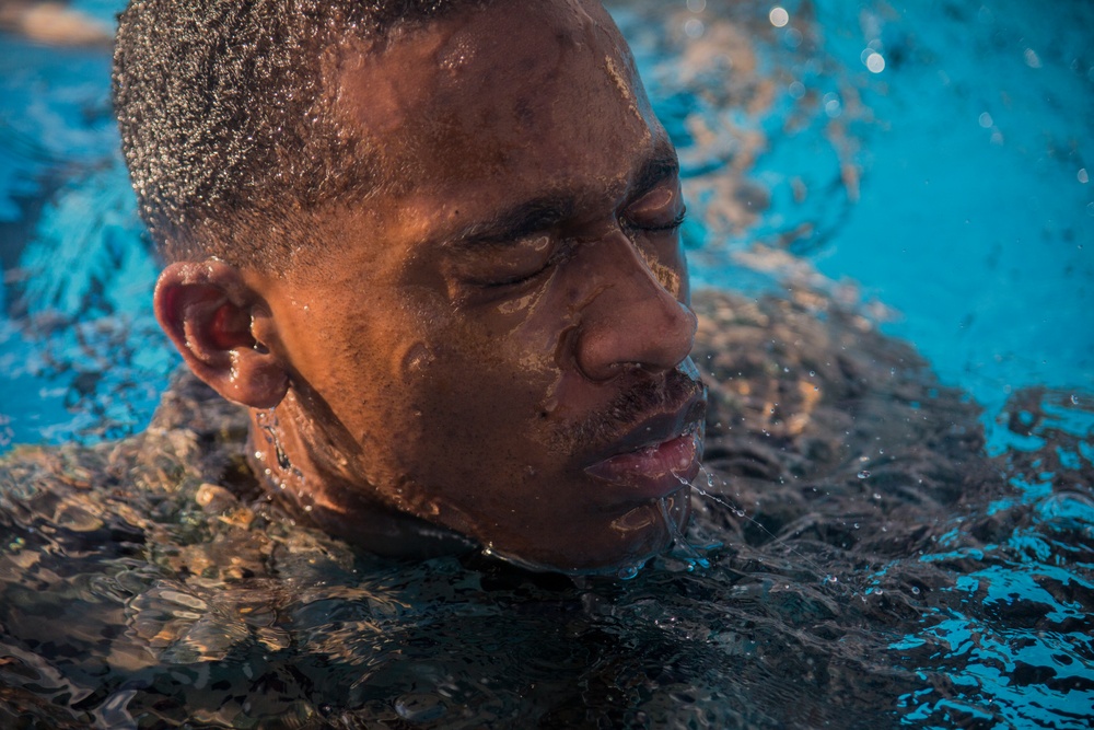 Marines, sailors endure water survival advanced training