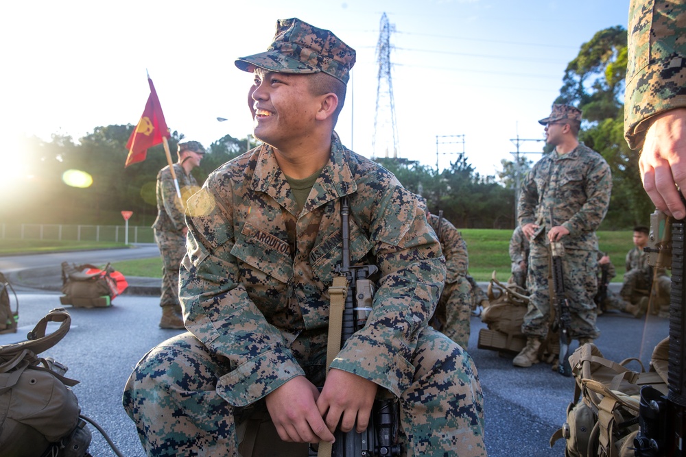 U.S. Marines with 12th Marine Regiment conduct a conditioning hike