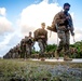 U.S. Marines with 12th Marine Regiment conduct a conditioning hike