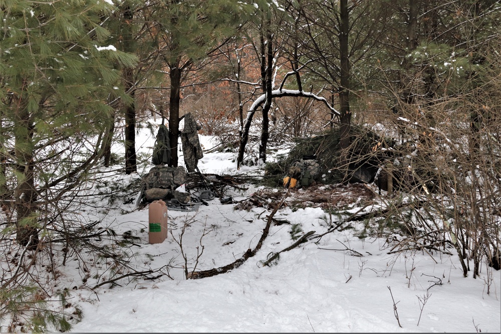 Cold-Weather Operations Course Class 20-02 students conduct field ops, improvised shelter construction