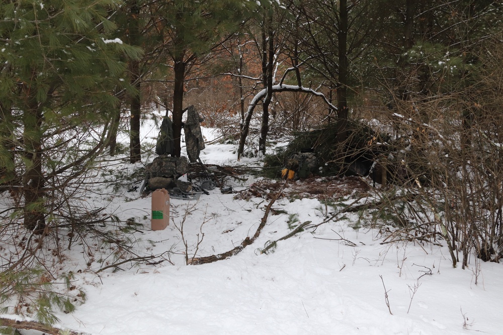 Cold-Weather Operations Course Class 20-02 students conduct field ops, improvised shelter construction