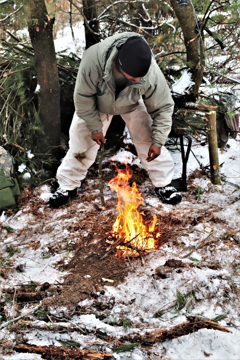 Cold-Weather Operations Course Class 20-02 students conduct field ops, improvised shelter construction